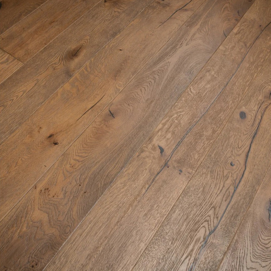 Medium brown hardwood flooring planks with visible natural grain patterns and knots.
