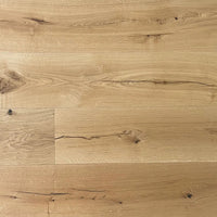 Light oak wood flooring planks with visible grain, knots, and natural wood textures.