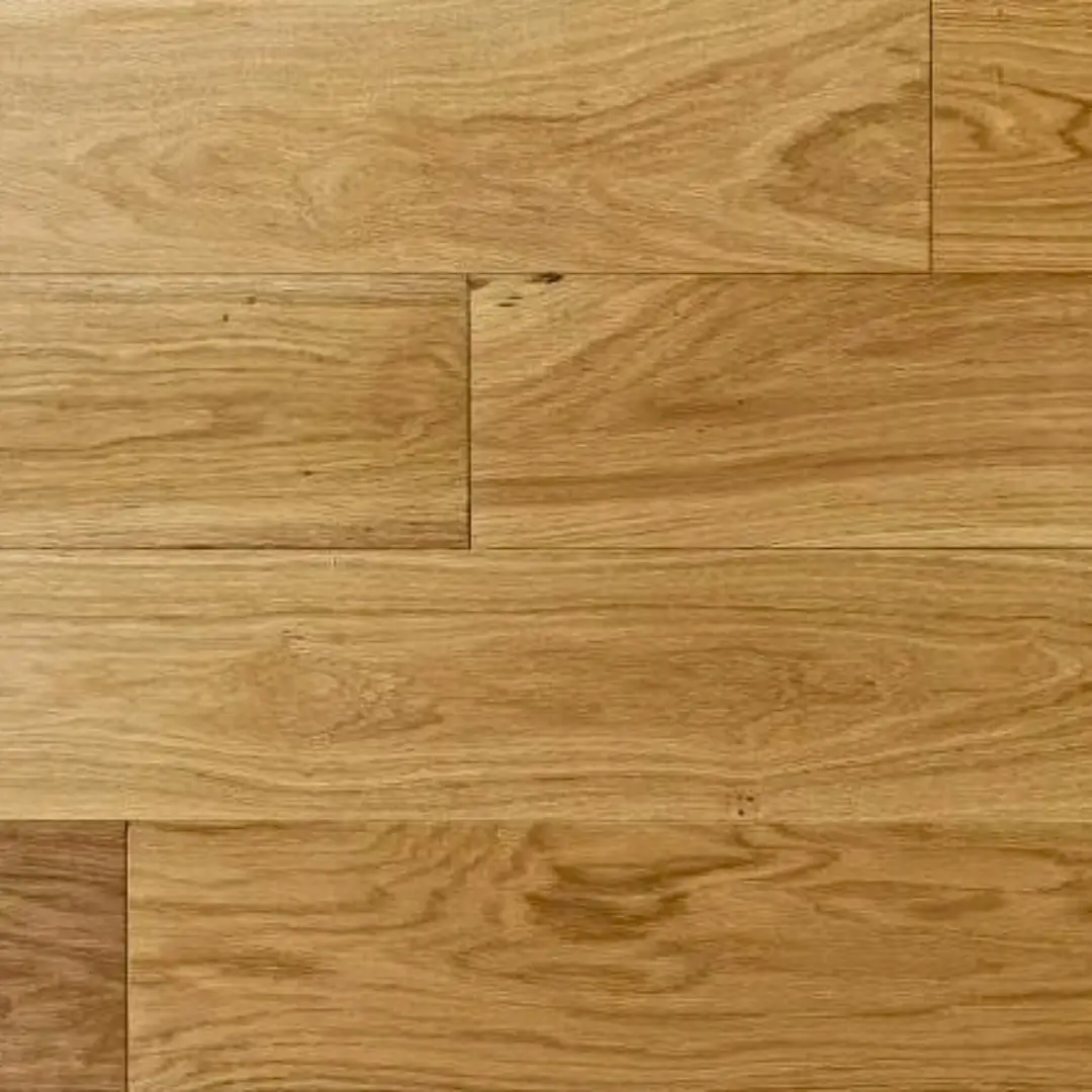 Side-angle view of Natural Oak Lacquered planks highlighting soft sheen and clean plank definition