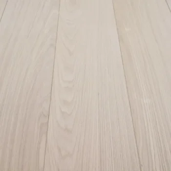 Close-up of Prime Unfinished Oak flooring showing wide plank texture with detailed open grain look