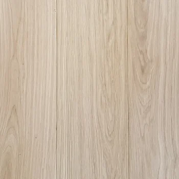 Close-up view of Prime Oak Unfinished wood flooring showing natural grain texture