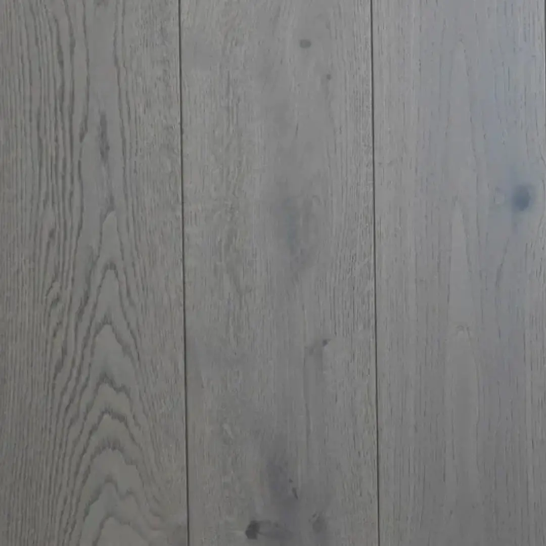 Close-up of Light Grey Rustic Oak showing brushed texture and matt lacquer finish