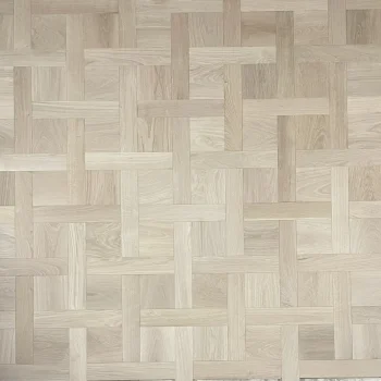A unfinished wood floor featuring a geometric square pattern, showcasing the elegance of classic unfinished oak flooring.