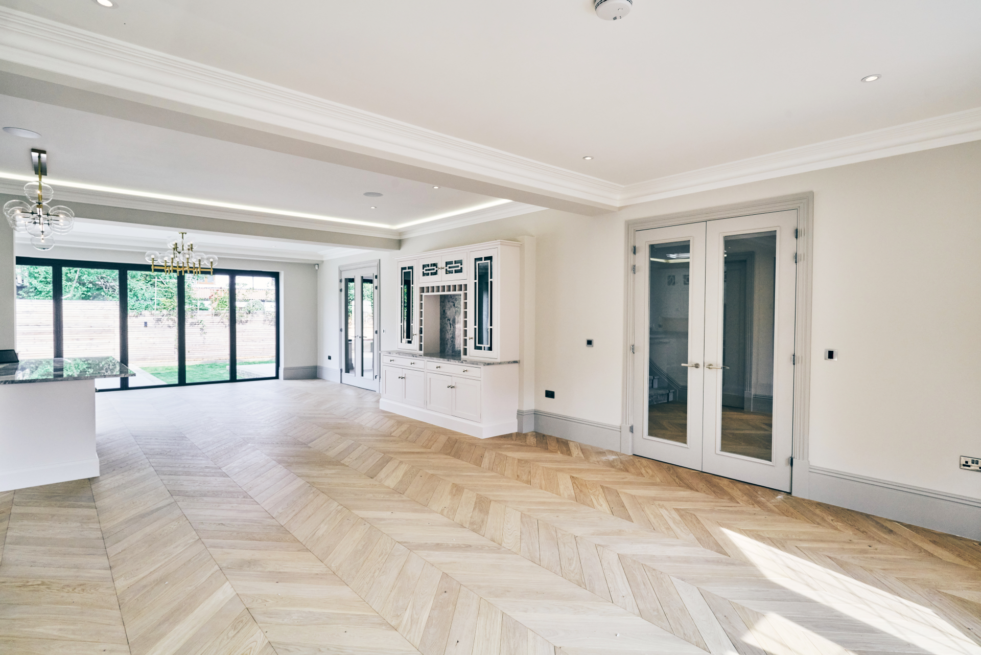 Luxury Chevron Invisible Oak brushed and oiled engineered flooring installed in a modern living room