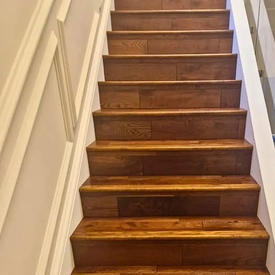Finished solid oak stair bull nosing fitted on stairs