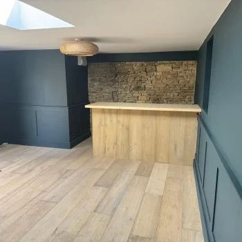 reclaimed effect oak installed in converted outhouse