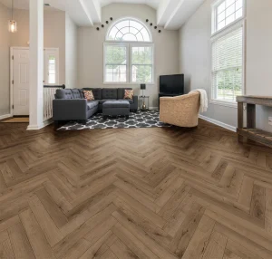 New Deluxe Laminate Smoked Oak Herringbone installed in a modern interior – 12 x 101 x 606mm