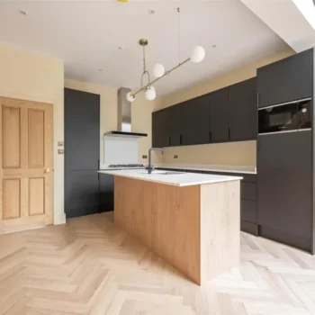 Invisible oak herringbone flooring installed in modern kitchen brushed and oiled engineered wood floor