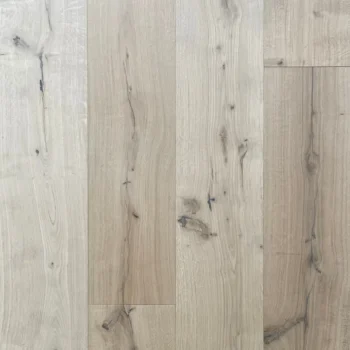 Close up of unfinished rustic oak flooring showing exposed grain lines and knots