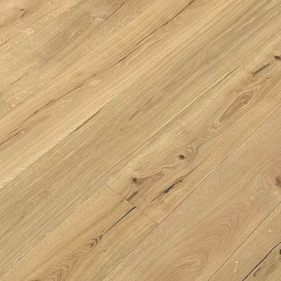 Angled view of Heritage Natural Oak Brushed UV Oiled engineered wood flooring showing the natural oak grain and brushed finish.